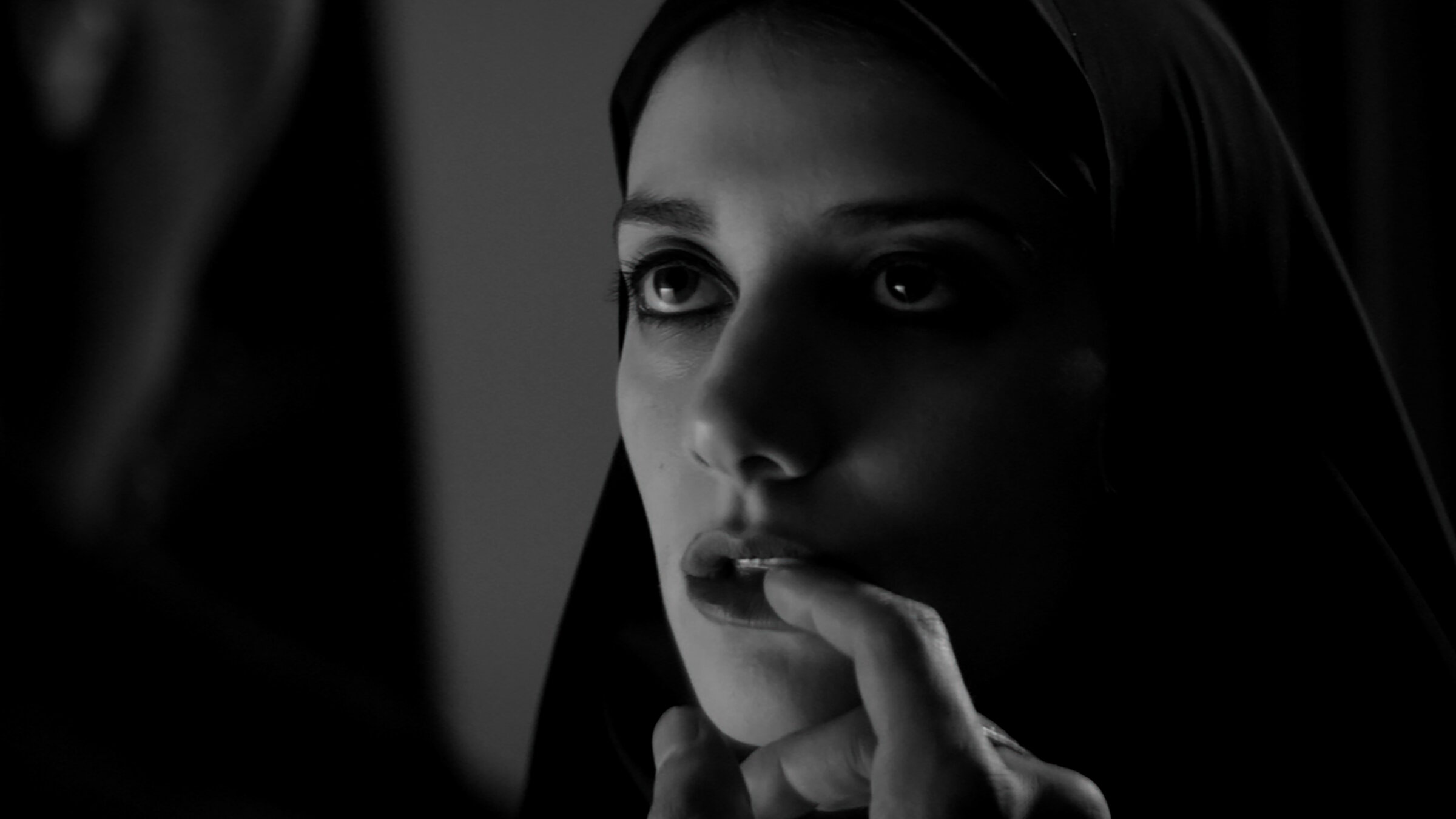 A GIRL WALKS HOME ALONE AT NIGHT