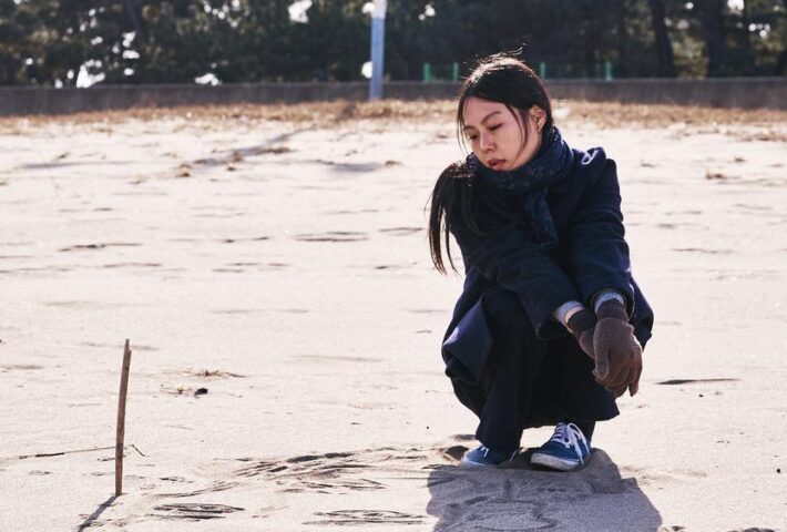 ON THE BEACH AT NIGHT ALONE