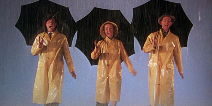 CANTANDO BAJO LA LLUVIA